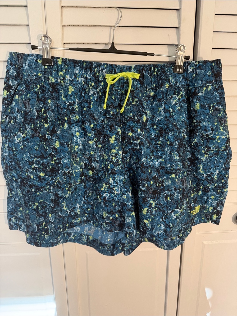 The North Face Blue Floral Athletic Shorts with Neon Yellow Drawstring